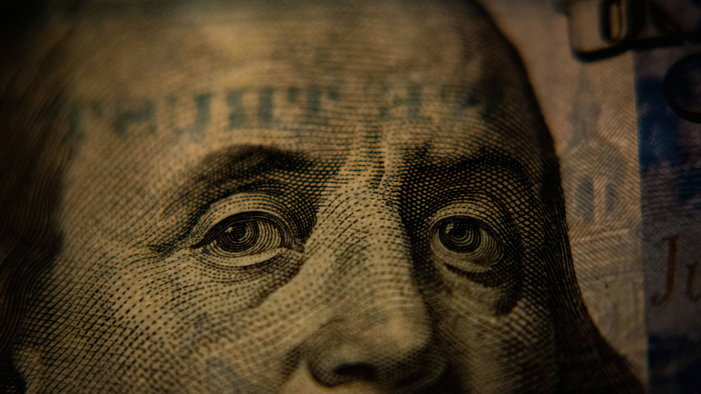 Close-up of currency details representing economic value, GDP and financial growth.