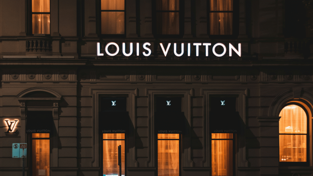 The exterior of a magnificent Louis Vuitton showroom, showcasing elegant architecture and the brand's iconic facade, representing the global retail footprint of luxury brands in high fashion.