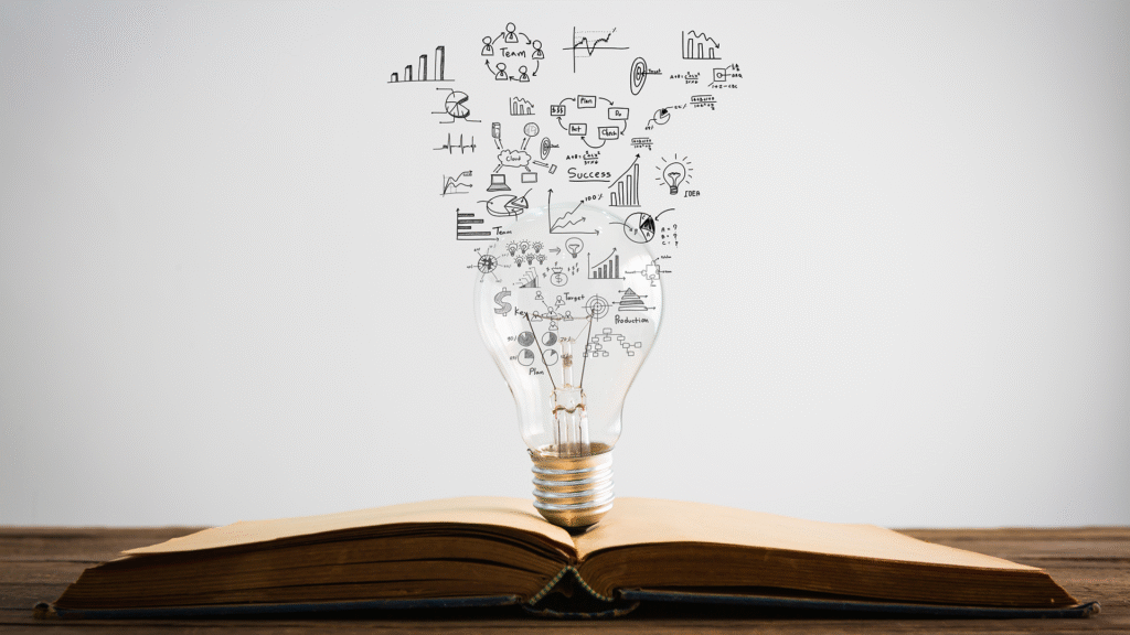 An open book with a glowing light bulb resting on its pages, from which colorful story elements and icons emerge, symbolizing creative storytelling and brand narratives.
