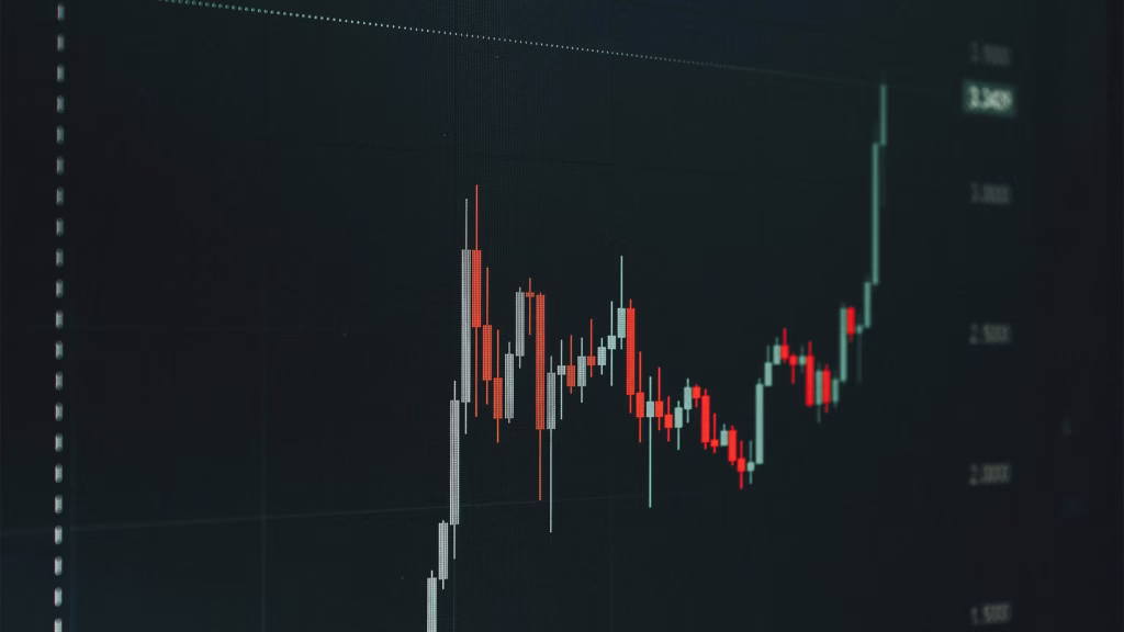 Candlestick stock chart with red and green price bars showing market volatility and different stock type behaviors