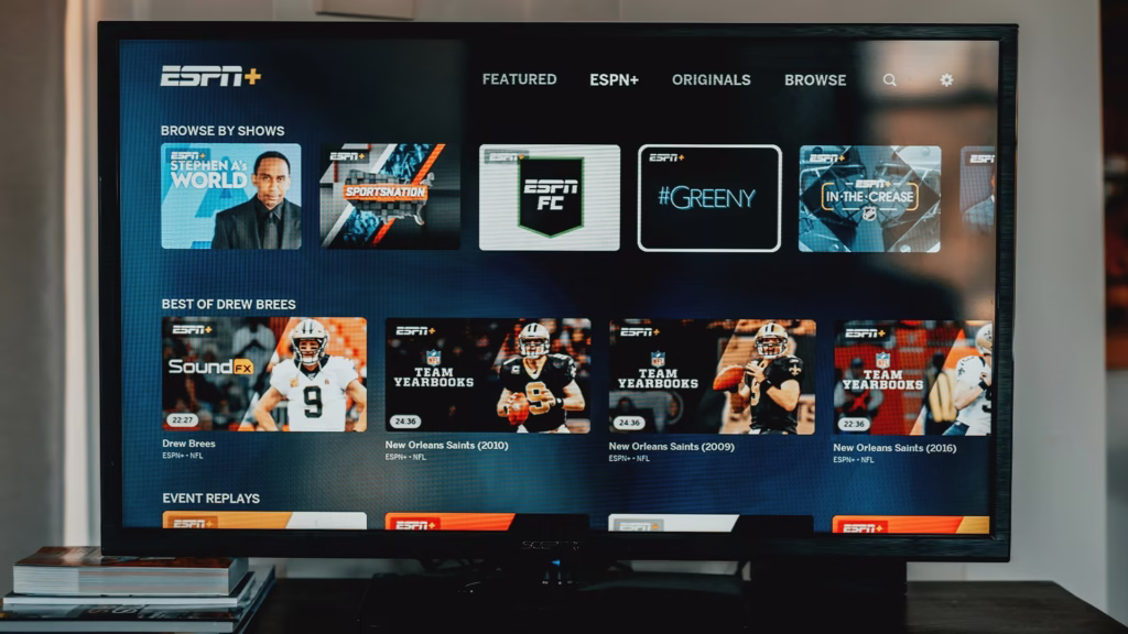 ESPN Plus streaming service interface showing original shows and NFL content representing ESPN's $29.99 monthly flagship streaming app launched August 2025 to offset $113 billion sports rights commitments and 7 million annual subscriber losses