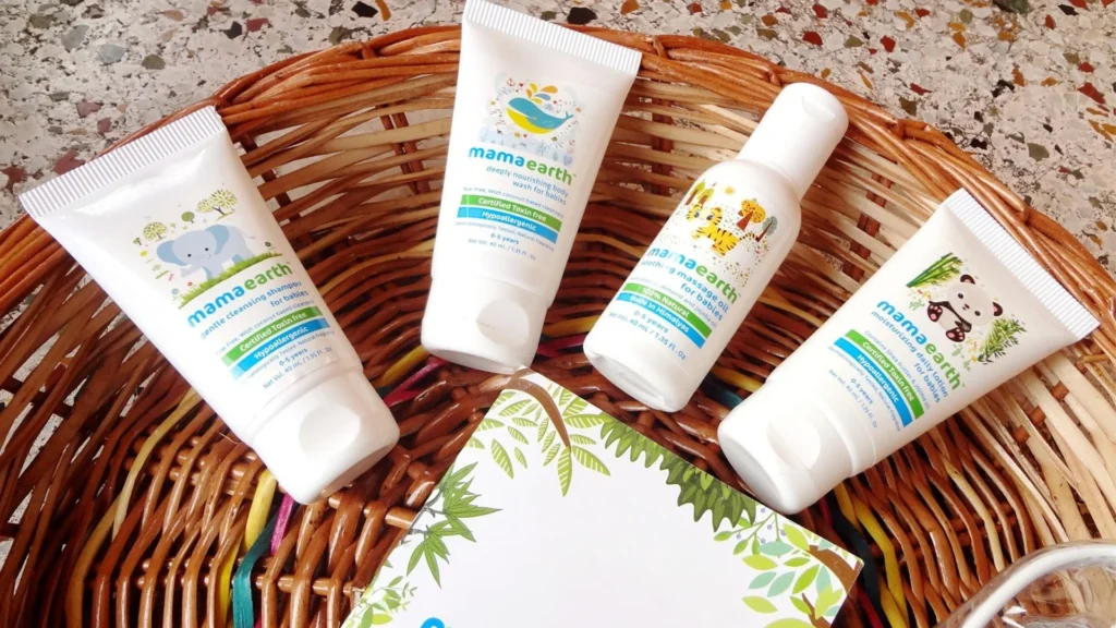 Mamaearth toxin-free baby and personal care products displayed in basket representing the D2C brand that grew to ₹2,067 crore revenue through MADE SAFE certification and digital-first strategy