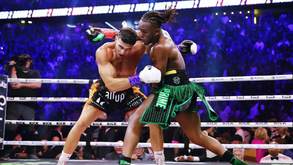 KSI and Tommy Fury boxing match at Manchester Arena representing influencer boxing economics with 1.3 million PPV buys generating $32 million revenue compared to traditional championship fights with lower viewership and revenue despite higher athletic skill