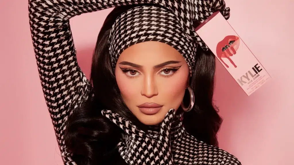 Kylie Jenner Kylie Cosmetics Coty sale featuring signature pink packaging and beauty products from the $600 million deal