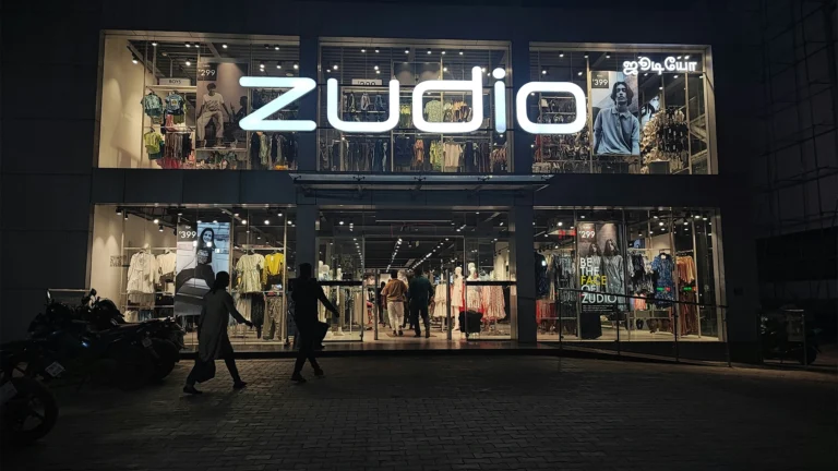 Zudio retail store exterior at night showing brand signage and large format layout demonstrating Trent's disruptive budget fashion strategy in Indian retail market