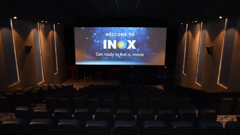 PVR multiplex auditorium with large screen and blue seats representing India's largest cinema chain