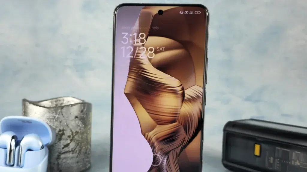Xiaomi smartphone with earbuds and accessories showing the brand's value-for-money product lineup and pricing strategy